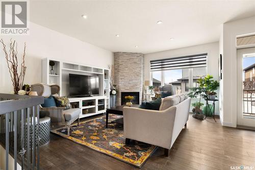 3973 Sandhill Crescent, Regina, SK - Indoor Photo Showing Living Room With Fireplace
