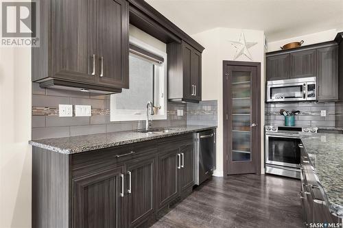 3973 Sandhill Crescent, Regina, SK - Indoor Photo Showing Kitchen With Stainless Steel Kitchen With Double Sink