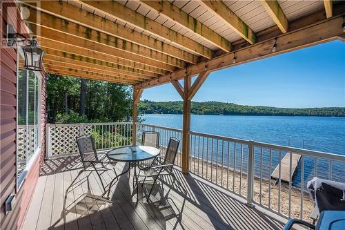 108 Kubishack Lane Unit#A, Barry'S Bay, ON - Outdoor With Body Of Water With Deck Patio Veranda With Exterior