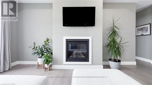33 Brooklawn Drive, Lambton Shores, ON - Indoor Photo Showing Living Room With Fireplace