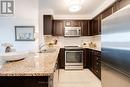 #307 -50 Via Rosedale Way, Brampton, ON  - Indoor Photo Showing Kitchen With Double Sink 