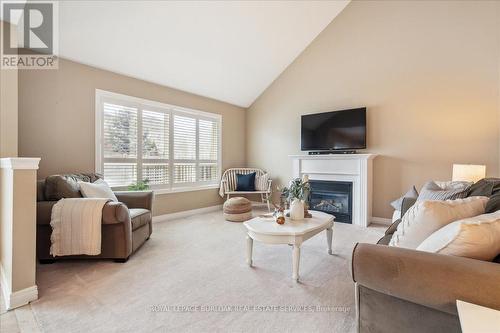 1009 Holdsworth Cres, Milton, ON - Indoor Photo Showing Living Room With Fireplace