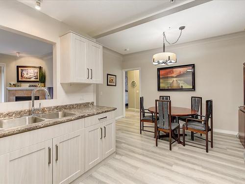 210-1966 Enterprise Way, Kelowna, BC - Indoor Photo Showing Living Room