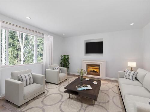 386 Avaani Way, Nanaimo, BC - Indoor Photo Showing Living Room With Fireplace