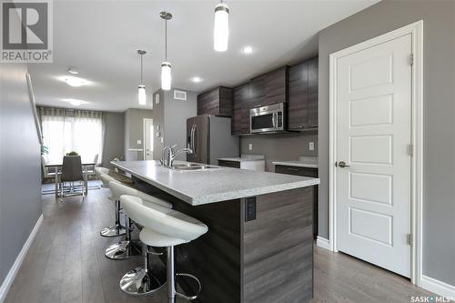 5 4801 Trinity Lane, Regina, SK - Indoor Photo Showing Kitchen With Double Sink With Upgraded Kitchen