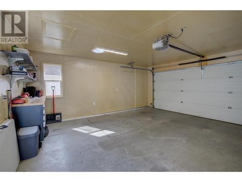 665 Cook Road Unit# 102, Kelowna, BC - Indoor Photo Showing Garage
