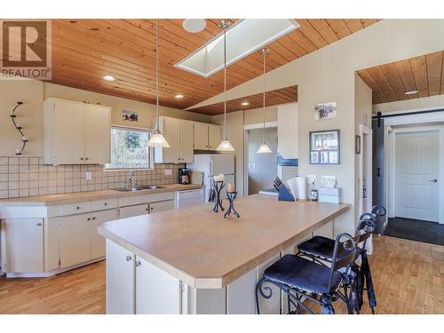 4725 Chilcotin Crescent, 108 Mile Ranch, BC - Indoor Photo Showing Kitchen With Double Sink