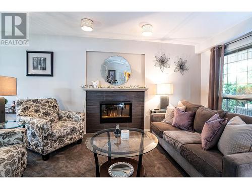 806 First Street, Revelstoke, BC - Indoor Photo Showing Living Room With Fireplace