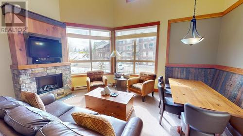 4559 Timberline Crescent Unit# 643C, Fernie, BC - Indoor Photo Showing Living Room With Fireplace