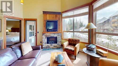 4559 Timberline Crescent Unit# 643C, Fernie, BC - Indoor Photo Showing Living Room With Fireplace