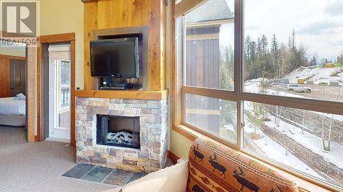 4559 Timberline Crescent Unit# 643C, Fernie, BC - Indoor Photo Showing Living Room With Fireplace