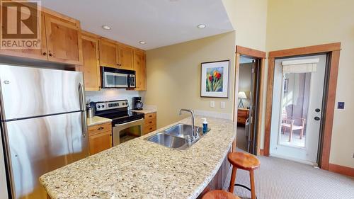 4559 Timberline Crescent Unit# 643C, Fernie, BC - Indoor Photo Showing Kitchen With Double Sink