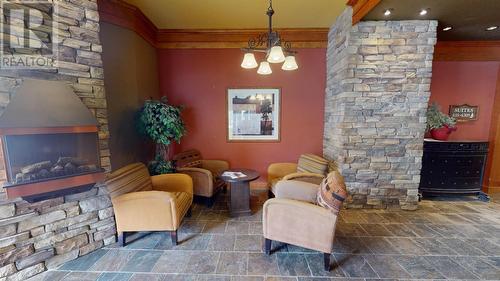 4559 Timberline Crescent Unit# 643C, Fernie, BC - Indoor With Fireplace