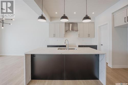247 Prasad Manor, Saskatoon, SK - Indoor Photo Showing Kitchen With Double Sink With Upgraded Kitchen