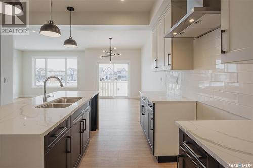 247 Prasad Manor, Saskatoon, SK - Indoor Photo Showing Kitchen With Double Sink With Upgraded Kitchen