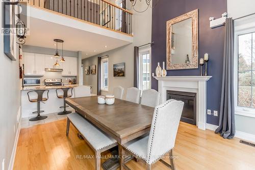 #42 -171 Snowbridge Way, Blue Mountains, ON - Indoor Photo Showing Dining Room With Fireplace
