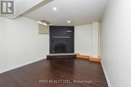 68 Jill Cres, Brampton, ON - Indoor With Fireplace