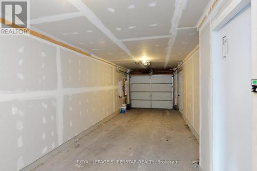 #80 -369 Essa Rd, Barrie, ON - Indoor Photo Showing Garage