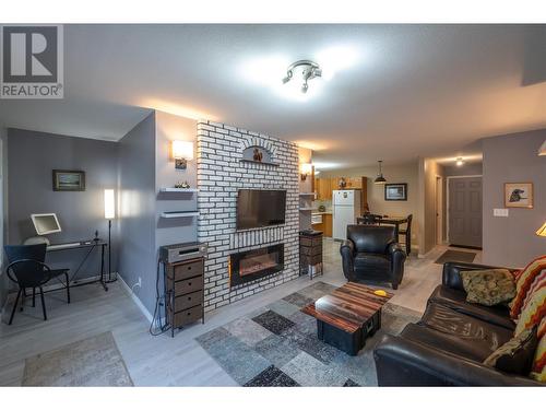 865 Main Street Unit# 204, Penticton, BC - Indoor Photo Showing Living Room With Fireplace