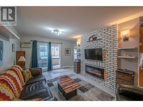 865 Main Street Unit# 204, Penticton, BC - Indoor Photo Showing Living Room With Fireplace