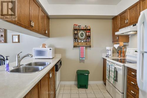 1 - 11 Laguna Parkway, Ramara (Brechin), ON - Indoor Photo Showing Kitchen With Double Sink