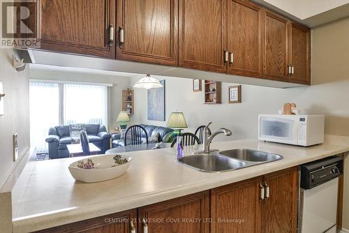 1 - 11 Laguna Parkway, Ramara (Brechin), ON - Indoor Photo Showing Kitchen With Double Sink