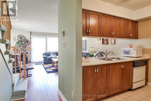 1 - 11 Laguna Parkway, Ramara, ON - Indoor Photo Showing Kitchen With Double Sink