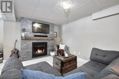 6394 Bluebird Street, Ramara, ON - Indoor Photo Showing Living Room With Fireplace