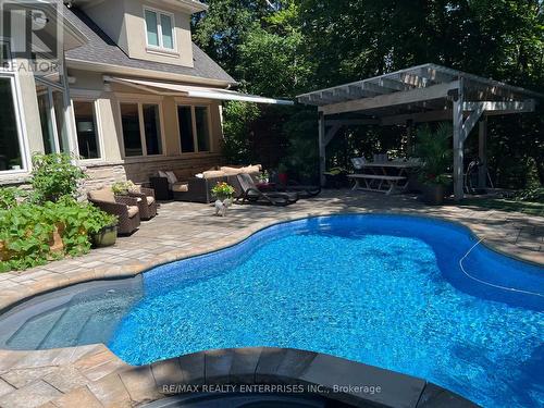 1230 Queen Victoria Ave, Mississauga, ON - Outdoor With In Ground Pool
