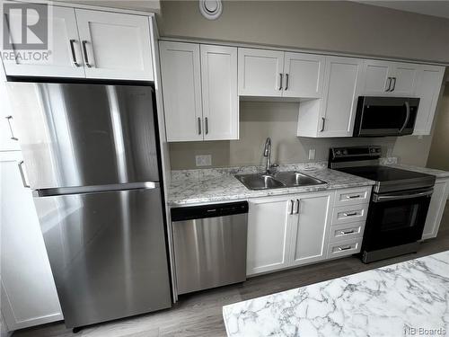1757 Water Street Unit# A / B, Miramichi, NB - Indoor Photo Showing Kitchen With Double Sink