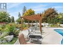 1605 Crawford Road, Kelowna, BC  - Outdoor With In Ground Pool 