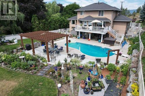 1605 Crawford Road, Kelowna, BC - Outdoor With In Ground Pool With Deck Patio Veranda