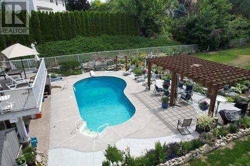 1605 Crawford Road, Kelowna, BC - Outdoor With In Ground Pool With Backyard