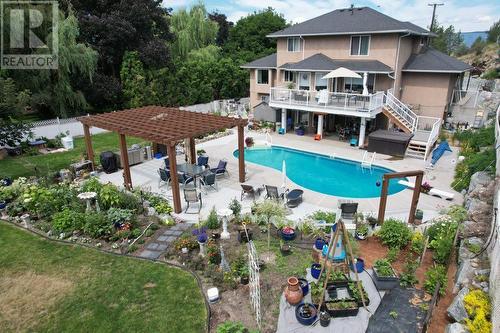 1605 Crawford Road, Kelowna, BC - Outdoor With In Ground Pool With Deck Patio Veranda