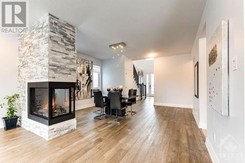 576 Cope Drive, Ottawa, ON - Indoor Photo Showing Other Room With Fireplace