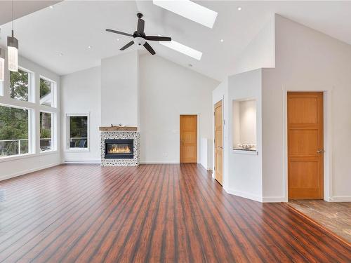 225 Mariners Way, Mayne Island, BC - Indoor Photo Showing Other Room With Fireplace