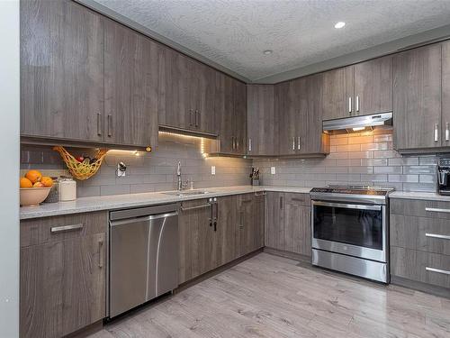 103-2253 Townsend Rd, Sooke, BC - Indoor Photo Showing Kitchen With Stainless Steel Kitchen