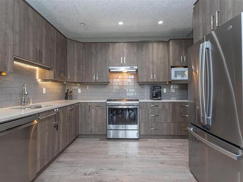 103-2253 Townsend Rd, Sooke, BC - Indoor Photo Showing Kitchen With Stainless Steel Kitchen With Upgraded Kitchen