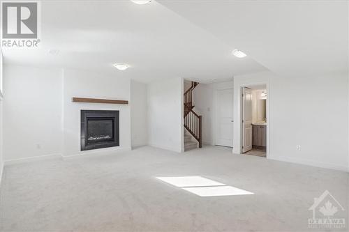 521 Corretto Place, Ottawa, ON - Indoor With Fireplace