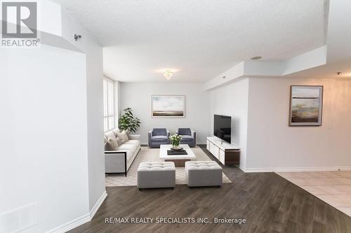 209 - 4640 Kimbermount Avenue S, Mississauga, ON - Indoor Photo Showing Living Room