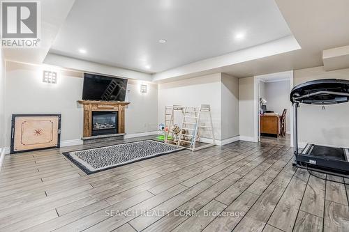 8 Ridelle Crt, Brampton, ON - Indoor With Fireplace