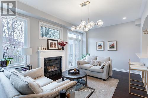 3366 Whilabout Terr, Oakville, ON - Indoor Photo Showing Living Room With Fireplace