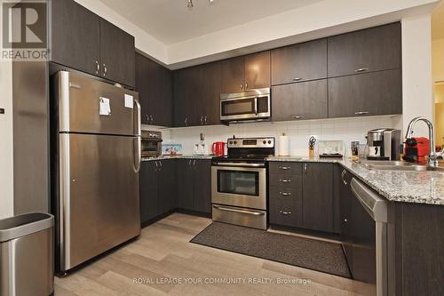 #320 -28 Prince Regent St, Markham, ON - Indoor Photo Showing Kitchen With Double Sink With Upgraded Kitchen
