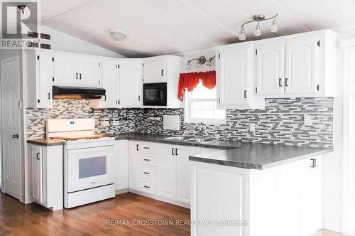 12 Prince Edward Drive, Springwater, ON - Indoor Photo Showing Kitchen With Upgraded Kitchen