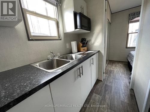 #34 -1235 Villiers Line, Otonabee-South Monaghan, ON - Indoor Photo Showing Kitchen With Double Sink