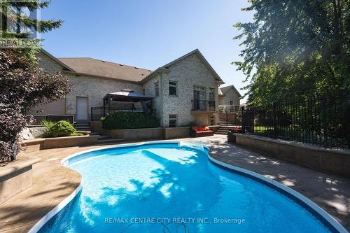 1619 Westdel Bourne Rd S, London, ON - Outdoor With In Ground Pool