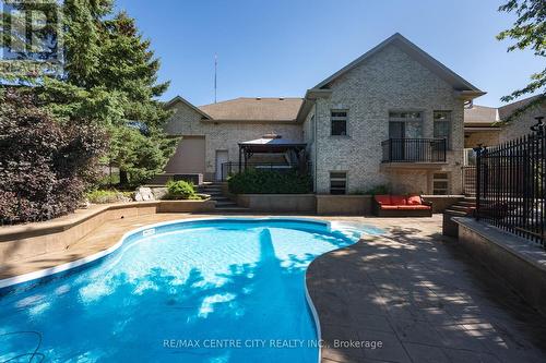 1619 Westdel Bourne Rd S, London, ON - Outdoor With In Ground Pool