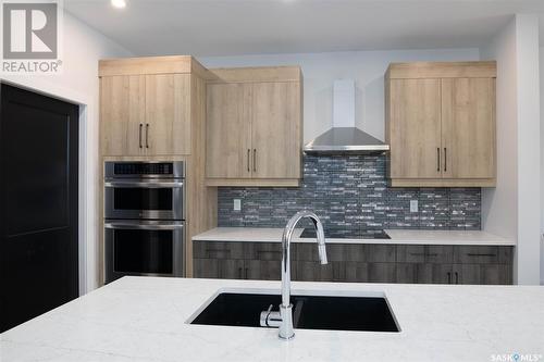 124 Durham Drive, Regina, SK - Indoor Photo Showing Kitchen With Double Sink