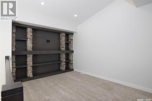 124 Durham Drive, Regina, SK - Indoor With Fireplace