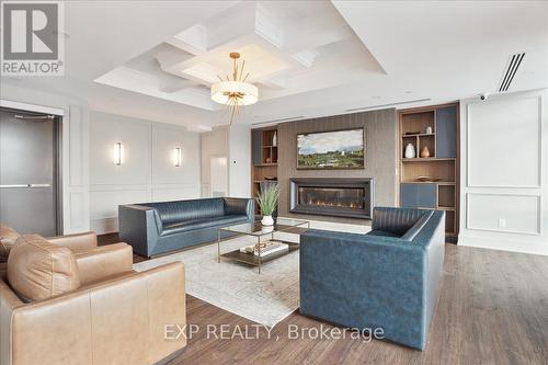 #308 -450 Dundas St E, Hamilton, ON - Indoor Photo Showing Living Room With Fireplace